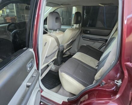 Червоний Ніссан ІксТрейл, об'ємом двигуна 2 л та пробігом 250 тис. км за 4499 $, фото 5 на Automoto.ua