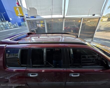 Червоний Ніссан ІксТрейл, об'ємом двигуна 2 л та пробігом 250 тис. км за 4499 $, фото 3 на Automoto.ua