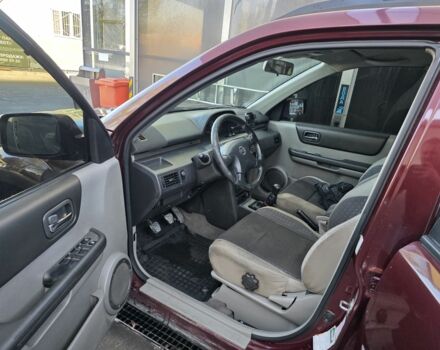 Червоний Ніссан ІксТрейл, об'ємом двигуна 2 л та пробігом 250 тис. км за 4499 $, фото 4 на Automoto.ua