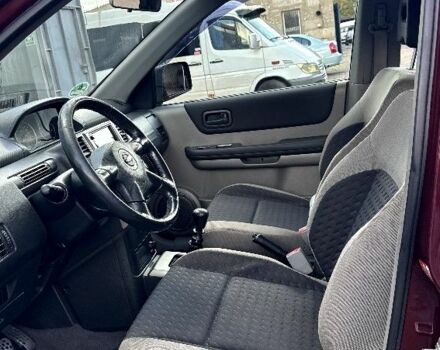 Красный Ниссан ИксТрейл, объемом двигателя 2.2 л и пробегом 1 тыс. км за 4500 $, фото 4 на Automoto.ua