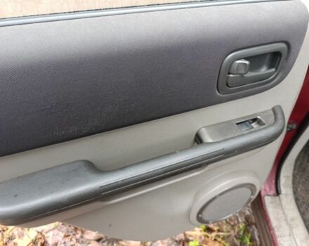 Красный Ниссан ИксТрейл, объемом двигателя 2.2 л и пробегом 400 тыс. км за 3500 $, фото 9 на Automoto.ua