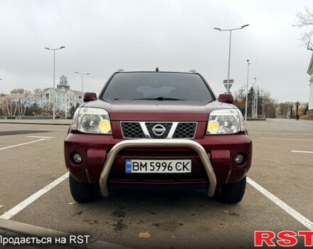 Красный Ниссан ИксТрейл, объемом двигателя 2.5 л и пробегом 270 тыс. км за 5600 $, фото 12 на Automoto.ua