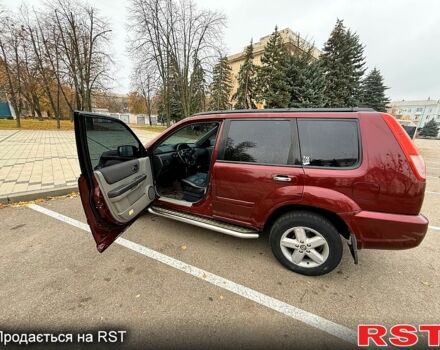 Красный Ниссан ИксТрейл, объемом двигателя 2.5 л и пробегом 270 тыс. км за 5600 $, фото 3 на Automoto.ua