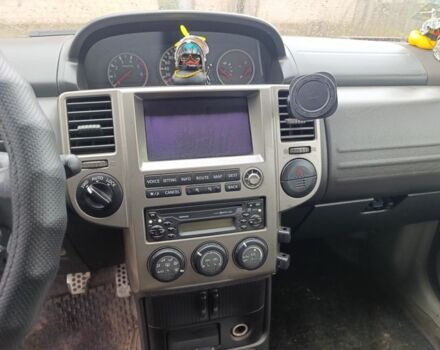 Красный Ниссан ИксТрейл, объемом двигателя 2.2 л и пробегом 400 тыс. км за 3500 $, фото 7 на Automoto.ua