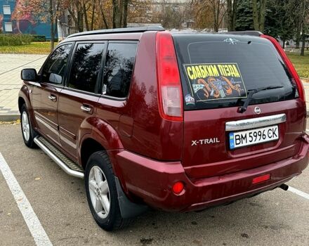 Красный Ниссан ИксТрейл, объемом двигателя 2.5 л и пробегом 270 тыс. км за 5600 $, фото 7 на Automoto.ua