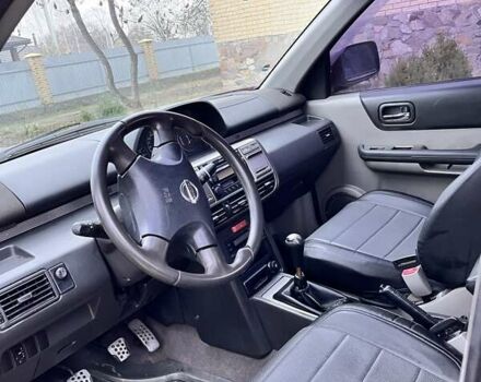 Красный Ниссан ИксТрейл, объемом двигателя 2 л и пробегом 227 тыс. км за 7250 $, фото 8 на Automoto.ua