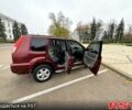 Красный Ниссан ИксТрейл, объемом двигателя 2.5 л и пробегом 270 тыс. км за 5600 $, фото 2 на Automoto.ua