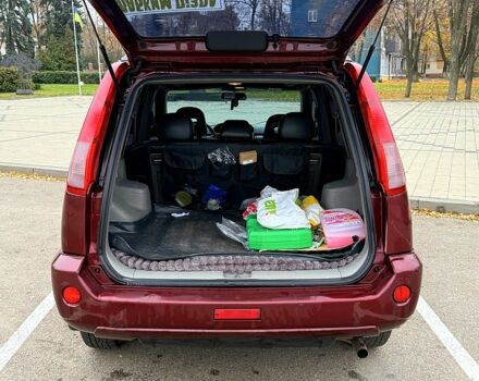 Красный Ниссан ИксТрейл, объемом двигателя 2.5 л и пробегом 270 тыс. км за 5600 $, фото 6 на Automoto.ua