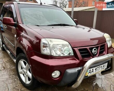 Красный Ниссан ИксТрейл, объемом двигателя 2 л и пробегом 227 тыс. км за 7250 $, фото 1 на Automoto.ua