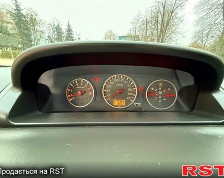 Красный Ниссан ИксТрейл, объемом двигателя 2.5 л и пробегом 270 тыс. км за 5600 $, фото 1 на Automoto.ua