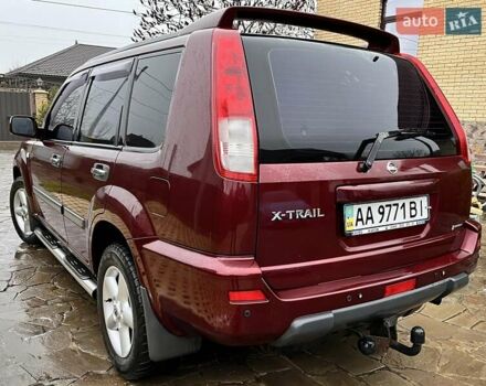 Красный Ниссан ИксТрейл, объемом двигателя 2 л и пробегом 227 тыс. км за 7250 $, фото 4 на Automoto.ua