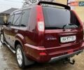 Красный Ниссан ИксТрейл, объемом двигателя 2 л и пробегом 227 тыс. км за 7250 $, фото 4 на Automoto.ua