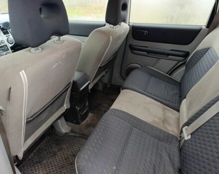 Красный Ниссан ИксТрейл, объемом двигателя 2.2 л и пробегом 400 тыс. км за 3500 $, фото 10 на Automoto.ua