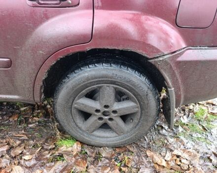 Красный Ниссан ИксТрейл, объемом двигателя 2.2 л и пробегом 400 тыс. км за 3500 $, фото 2 на Automoto.ua