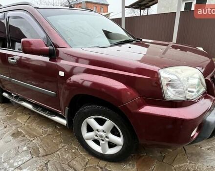 Красный Ниссан ИксТрейл, объемом двигателя 2 л и пробегом 227 тыс. км за 7250 $, фото 3 на Automoto.ua