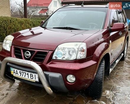 Красный Ниссан ИксТрейл, объемом двигателя 2 л и пробегом 227 тыс. км за 7250 $, фото 2 на Automoto.ua