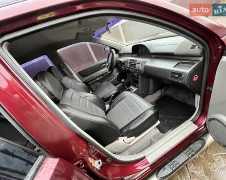 Красный Ниссан ИксТрейл, объемом двигателя 2 л и пробегом 227 тыс. км за 7250 $, фото 18 на Automoto.ua