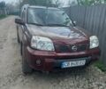 Червоний Ніссан ІксТрейл, об'ємом двигуна 2 л та пробігом 416 тис. км за 5800 $, фото 1 на Automoto.ua