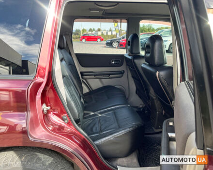 Красный Ниссан ИксТрейл, объемом двигателя 2.5 л и пробегом 280 тыс. км за 8600 $, фото 29 на Automoto.ua