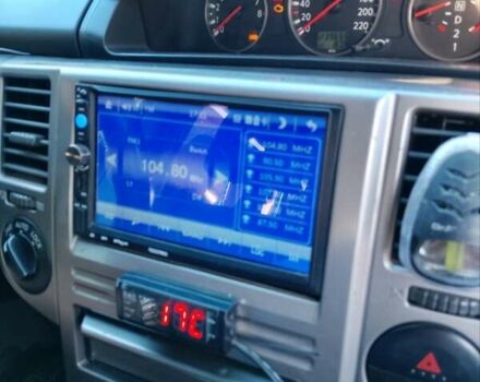 Червоний Ніссан ІксТрейл, об'ємом двигуна 2 л та пробігом 240 тис. км за 6250 $, фото 2 на Automoto.ua