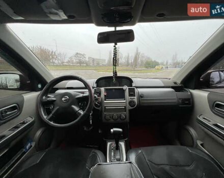 Красный Ниссан ИксТрейл, объемом двигателя 2.49 л и пробегом 298 тыс. км за 5999 $, фото 9 на Automoto.ua