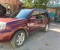 Красный Ниссан ИксТрейл, объемом двигателя 2.2 л и пробегом 250 тыс. км за 6000 $, фото 2 на Automoto.ua