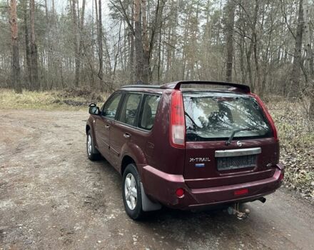 Красный Ниссан ИксТрейл, объемом двигателя 2.2 л и пробегом 160 тыс. км за 5000 $, фото 7 на Automoto.ua