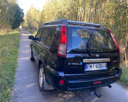 Красный Ниссан ИксТрейл, объемом двигателя 2.2 л и пробегом 335 тыс. км за 5008 $, фото 2 на Automoto.ua