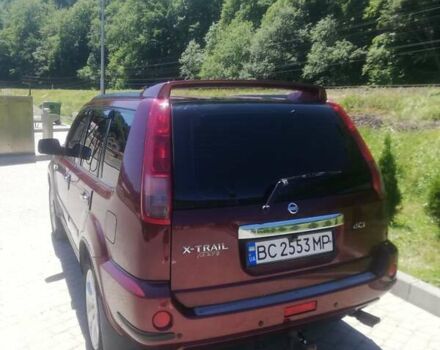 Красный Ниссан ИксТрейл, объемом двигателя 2.18 л и пробегом 320 тыс. км за 7200 $, фото 3 на Automoto.ua
