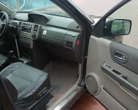 Красный Ниссан ИксТрейл, объемом двигателя 2.2 л и пробегом 335 тыс. км за 5008 $, фото 10 на Automoto.ua