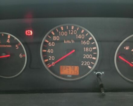 Красный Ниссан ИксТрейл, объемом двигателя 2.2 л и пробегом 335 тыс. км за 5008 $, фото 5 на Automoto.ua