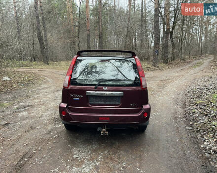 Красный Ниссан ИксТрейл, объемом двигателя 2.2 л и пробегом 160 тыс. км за 5000 $, фото 7 на Automoto.ua