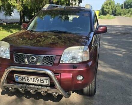 Красный Ниссан ИксТрейл, объемом двигателя 2 л и пробегом 172 тыс. км за 7299 $, фото 2 на Automoto.ua