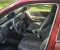 Красный Ниссан ИксТрейл, объемом двигателя 2 л и пробегом 172 тыс. км за 7299 $, фото 3 на Automoto.ua