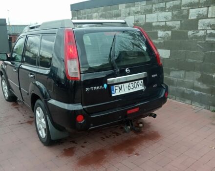 Красный Ниссан ИксТрейл, объемом двигателя 2.2 л и пробегом 335 тыс. км за 5008 $, фото 13 на Automoto.ua