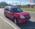 Червоний Ніссан ІксТрейл, об'ємом двигуна 2 л та пробігом 140 тис. км за 7500 $, фото 1 на Automoto.ua