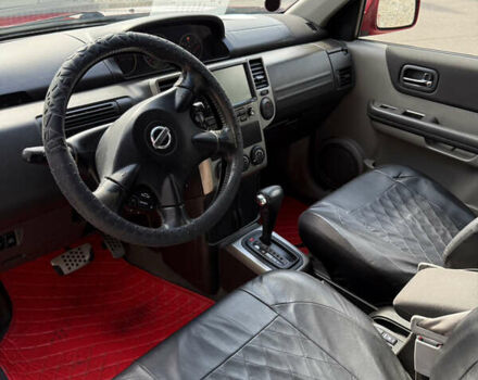 Червоний Ніссан ІксТрейл, об'ємом двигуна 2.49 л та пробігом 140 тис. км за 6900 $, фото 5 на Automoto.ua