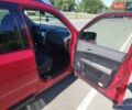 Червоний Ніссан ІксТрейл, об'ємом двигуна 2 л та пробігом 140 тис. км за 7500 $, фото 1 на Automoto.ua