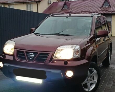 Красный Ниссан ИксТрейл, объемом двигателя 2 л и пробегом 170 тыс. км за 3400 $, фото 1 на Automoto.ua