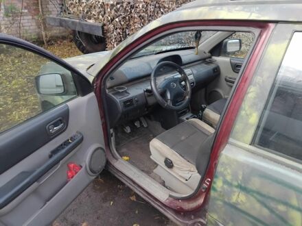 Красный Ниссан ИксТрейл, объемом двигателя 2.2 л и пробегом 450 тыс. км за 1430 $, фото 1 на Automoto.ua