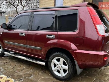 Червоний Ніссан ІксТрейл, об'ємом двигуна 2 л та пробігом 227 тис. км за 7250 $, фото 1 на Automoto.ua