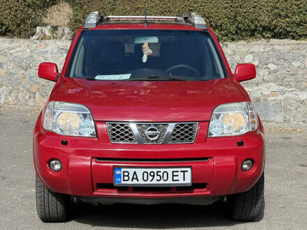 Красный Ниссан ИксТрейл, объемом двигателя 2.49 л и пробегом 140 тыс. км за 6900 $, фото 1 на Automoto.ua