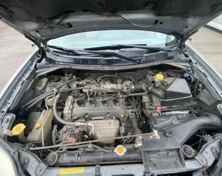 Серый Ниссан ИксТрейл, объемом двигателя 2 л и пробегом 330 тыс. км за 6000 $, фото 4 на Automoto.ua