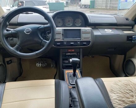 Серый Ниссан ИксТрейл, объемом двигателя 2 л и пробегом 330 тыс. км за 6000 $, фото 7 на Automoto.ua