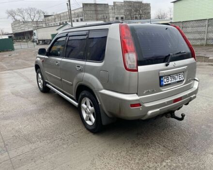 Серый Ниссан ИксТрейл, объемом двигателя 2 л и пробегом 330 тыс. км за 6000 $, фото 2 на Automoto.ua
