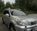 Серый Ниссан ИксТрейл, объемом двигателя 2.5 л и пробегом 250 тыс. км за 5817 $, фото 1 на Automoto.ua