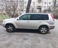 Серый Ниссан ИксТрейл, объемом двигателя 2 л и пробегом 196 тыс. км за 9000 $, фото 1 на Automoto.ua
