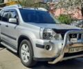 Сірий Ніссан ІксТрейл, об'ємом двигуна 2.5 л та пробігом 143 тис. км за 9985 $, фото 1 на Automoto.ua