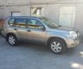 Сірий Ніссан ІксТрейл, об'ємом двигуна 2 л та пробігом 205 тис. км за 8500 $, фото 1 на Automoto.ua