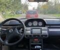 Серый Ниссан ИксТрейл, объемом двигателя 2 л и пробегом 231 тыс. км за 5300 $, фото 4 на Automoto.ua